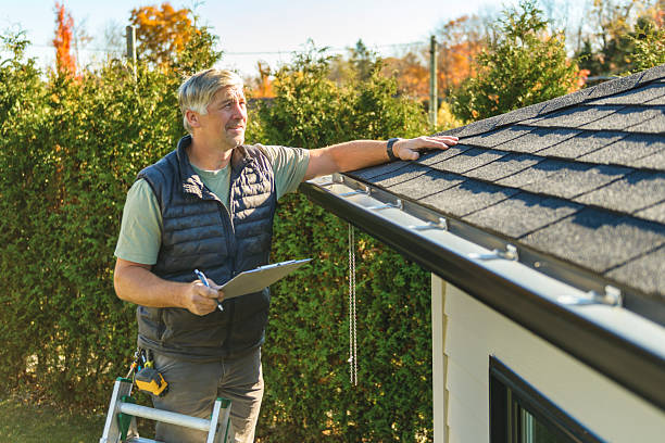 Professional Storm Damage Roof Repair technician working in Hamden, CT